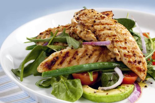 Grilled chicken tenderloins with avocado, tomatoes, red onion, green beans, spinach and arugula